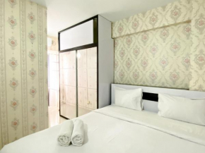 Homey and Comfortable 2BR Grand Sentraland Karawang Apartment By Travelio